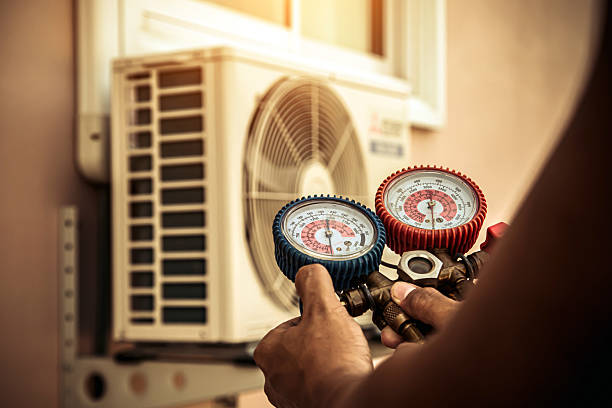 Professional Air Conditioning Service technician working in Oakdale, LA